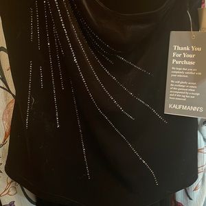 Black velvet top and skirt.